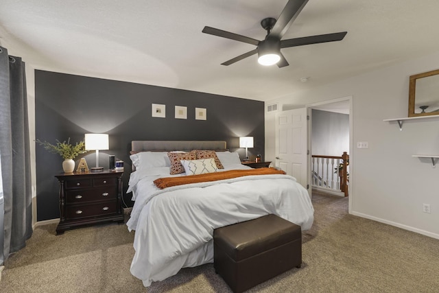 bedroom with ceiling fan and carpet