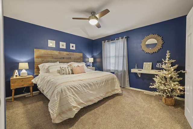 bedroom featuring ceiling fan and carpet floors