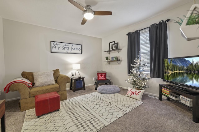 carpeted living room featuring ceiling fan