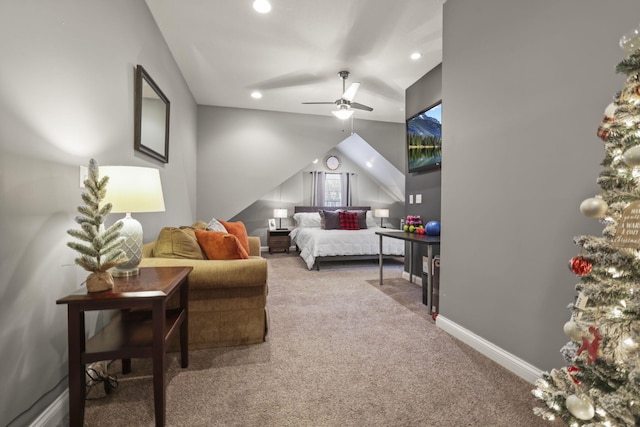 carpeted bedroom featuring vaulted ceiling and ceiling fan