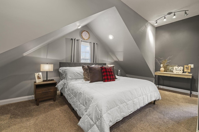 bedroom featuring carpet floors and vaulted ceiling