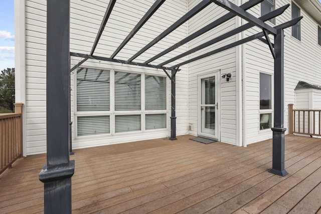 wooden terrace with a pergola