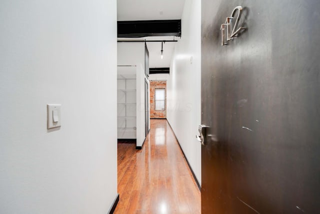 hallway featuring light wood-type flooring