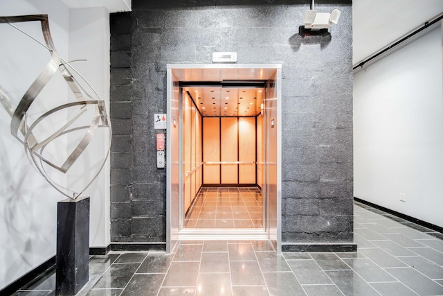 doorway to property with elevator