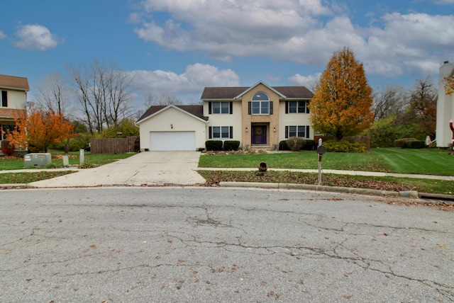 view of front facade featuring a front lawn and a garage