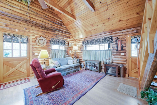 living room with beam ceiling, light wood-type flooring, high vaulted ceiling, and wood ceiling