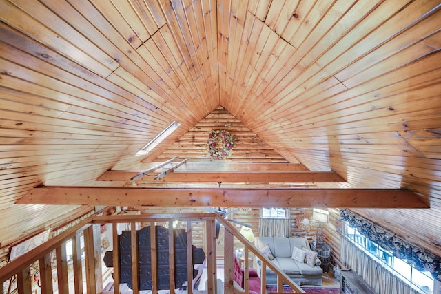 interior space with a healthy amount of sunlight, wood ceiling, and lofted ceiling