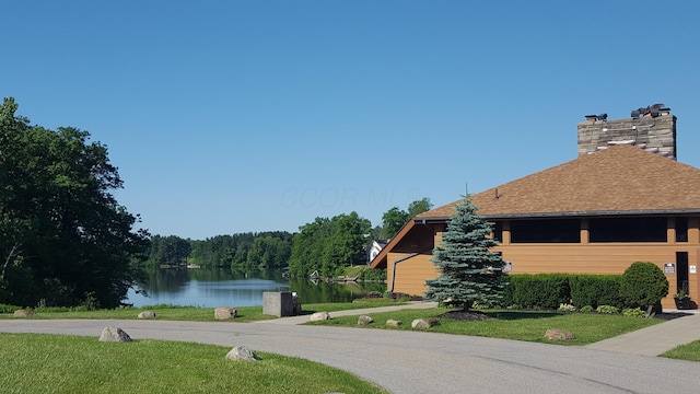 view of road featuring a water view