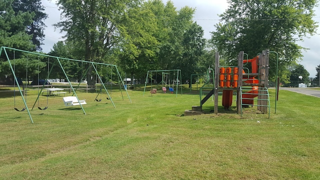 view of playground with a yard