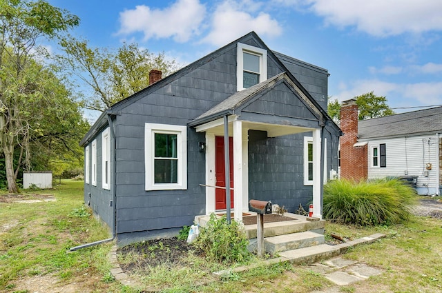 view of front of home with a front yard