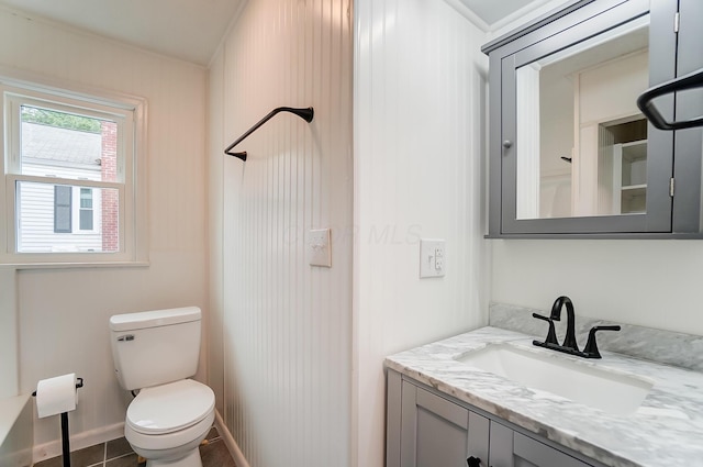 bathroom with vanity and toilet