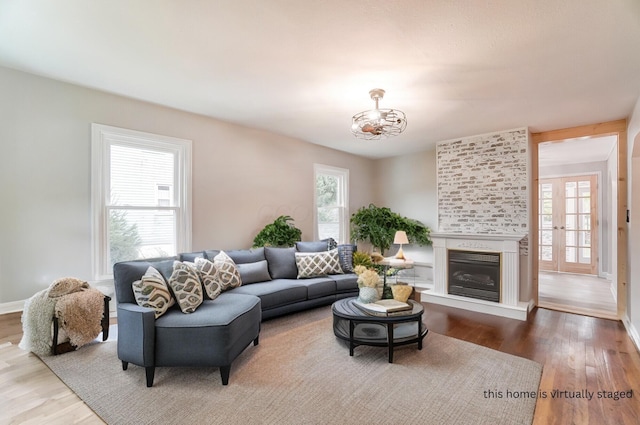 living room featuring a fireplace and hardwood / wood-style floors