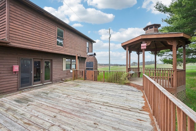 wooden deck featuring a gazebo