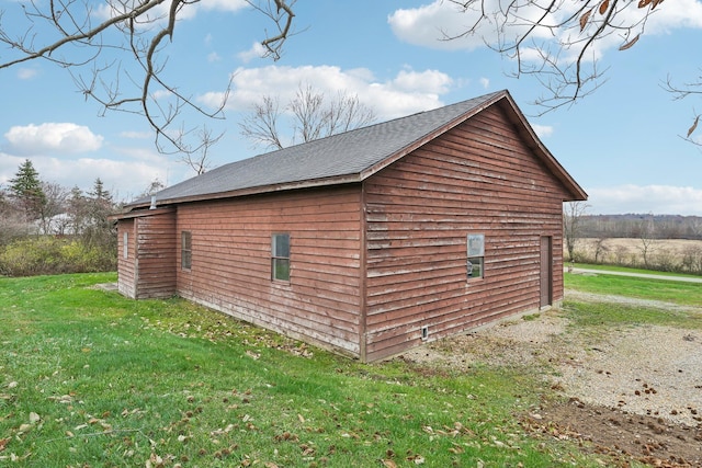 view of home's exterior featuring a yard