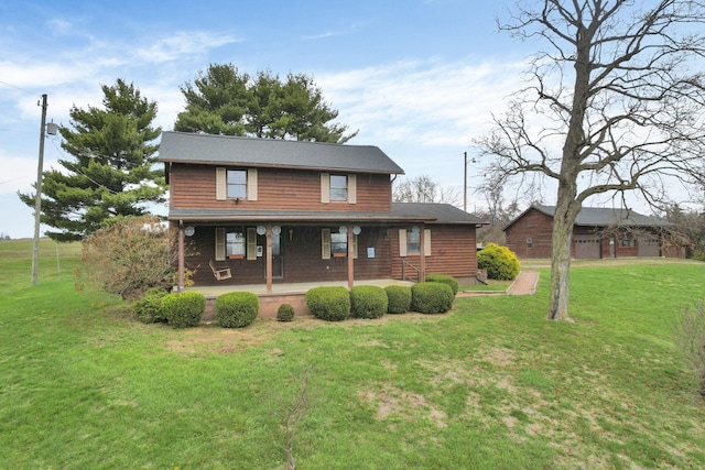 view of front facade featuring covered porch and a front yard