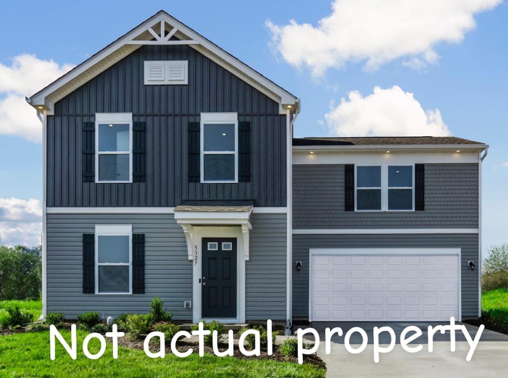 view of front of property featuring a garage