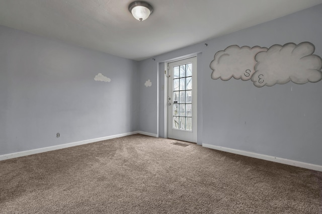 empty room with carpet floors