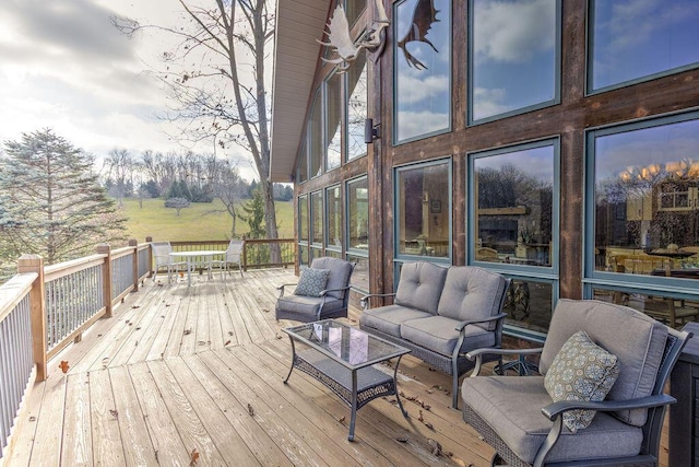 wooden deck with an outdoor hangout area