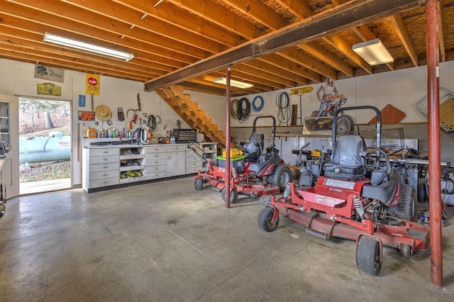 garage with a workshop area