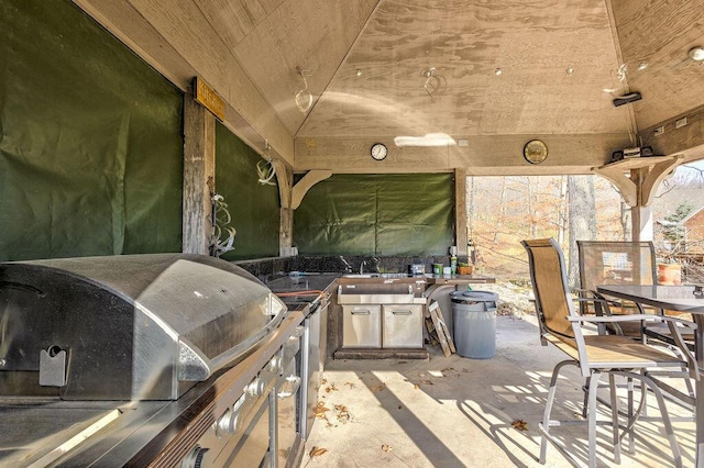 view of patio / terrace featuring an outdoor kitchen and grilling area