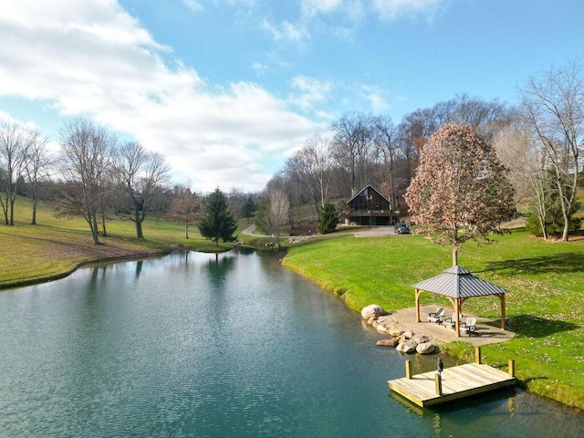 water view featuring a gazebo and a boat dock