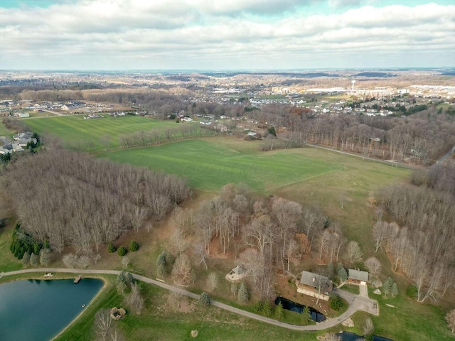 drone / aerial view featuring a rural view and a water view