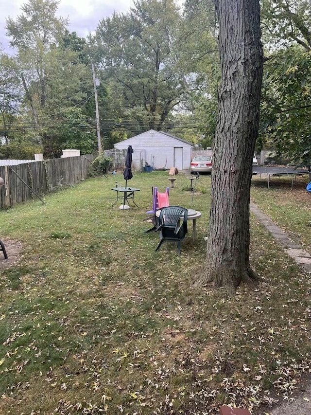 view of yard featuring a trampoline