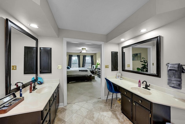 bathroom with vanity and ceiling fan