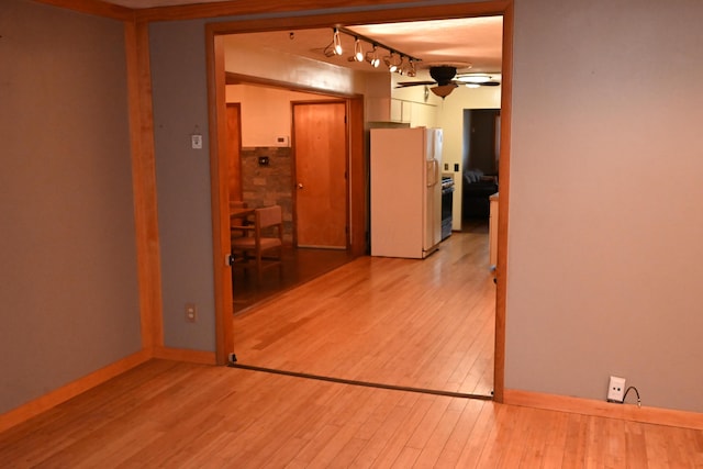 hallway featuring light wood-type flooring