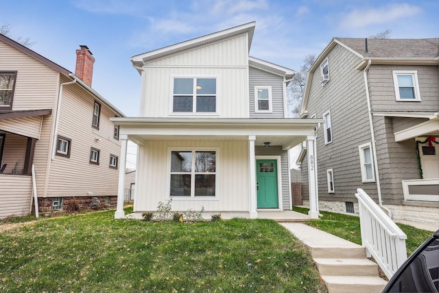 view of front of house featuring a porch and a front yard