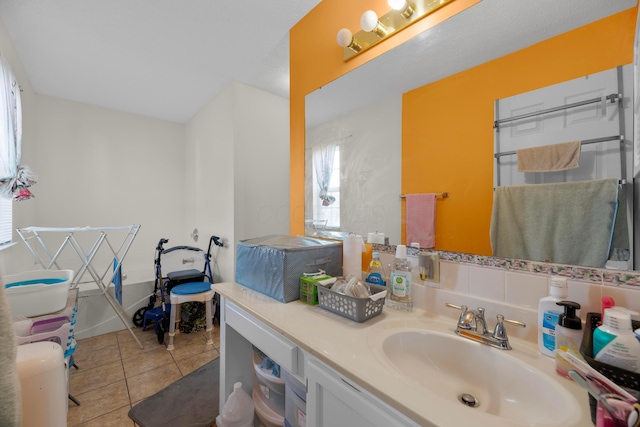 bathroom with tile patterned flooring and vanity