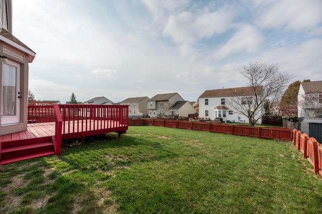 view of yard featuring a wooden deck