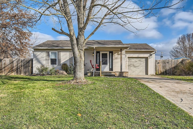 ranch-style home with a front yard and a garage