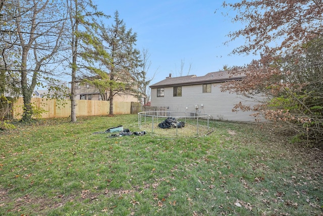 view of yard with a trampoline