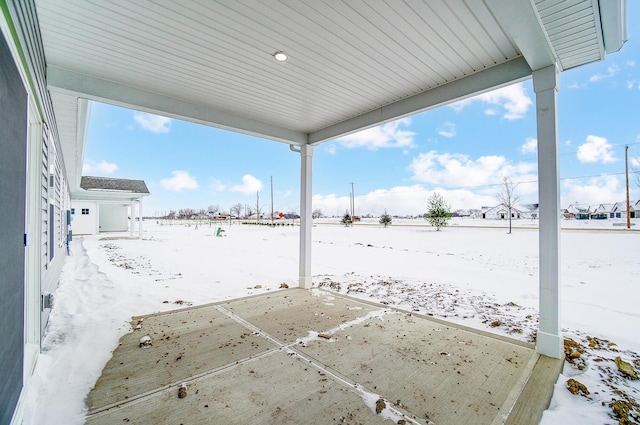 view of snow covered patio