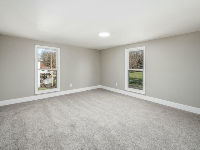 unfurnished room with carpet