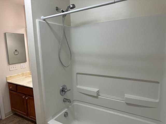 bathroom with vanity and shower / bathtub combination