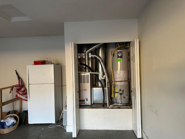 utility room featuring gas water heater