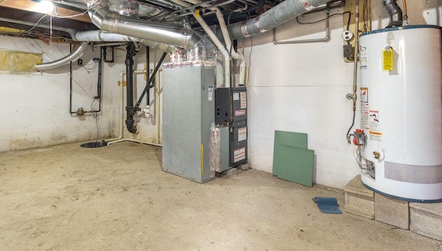 utility room featuring water heater