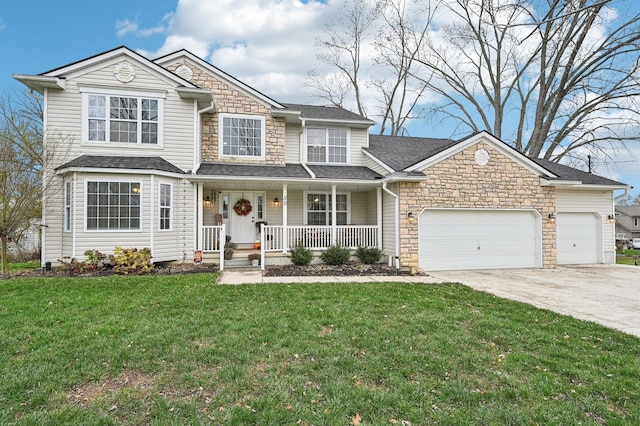 view of front of house with a front lawn, covered porch, and a garage