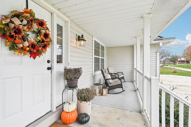 view of patio featuring a porch