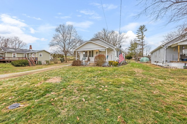 bungalow-style house featuring a front yard and a porch