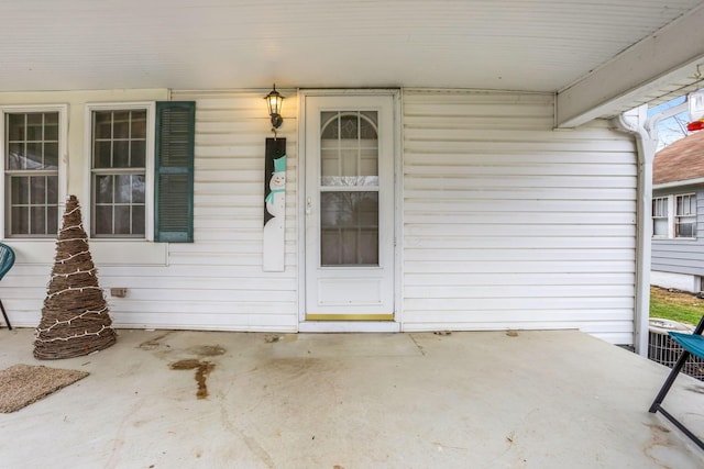 property entrance with a patio