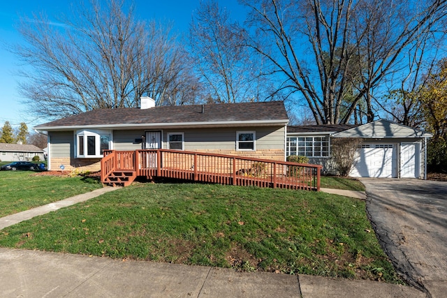 ranch-style house with a front lawn, a garage, and a deck