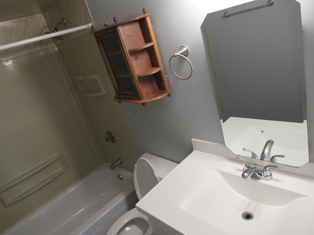 full bathroom featuring bathing tub / shower combination, sink, and toilet