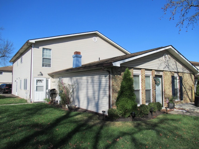 view of home's exterior featuring a lawn