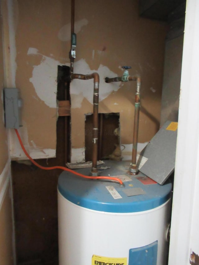 utility room with water heater