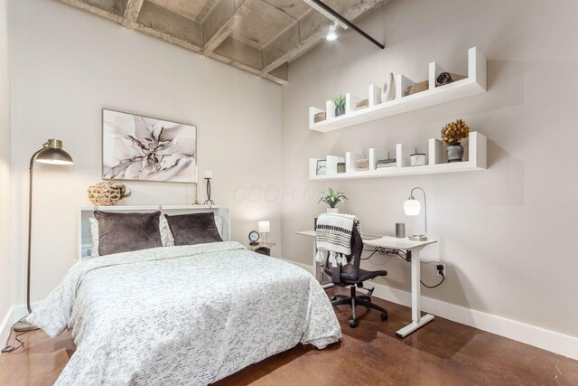 199 S 5th St Unit 406, Columbus, OH 43215 - bedroom with rail lighting and a desk