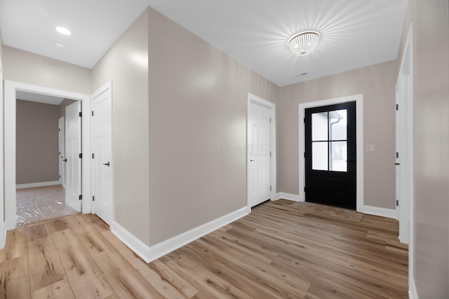 entrance foyer with light hardwood / wood-style floors