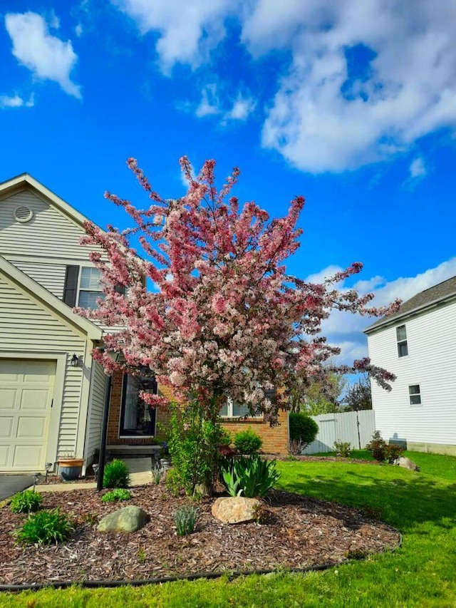 view of yard featuring a garage